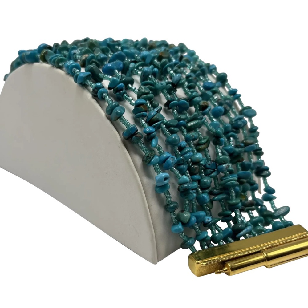 José and María Barrera Multi-
Strand Turquoise Bracelet